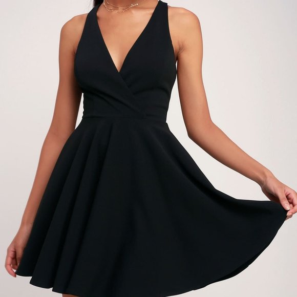 wonder whirl black twist back skater dress